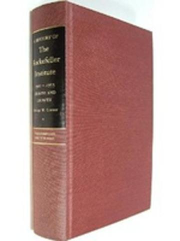 A red book standing on an angle with black area on upper third of spine. 